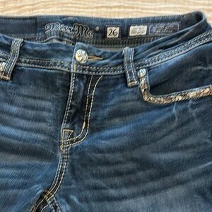 Miss me, jeans size 26 midrise easy skinny design in the USA
